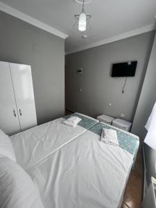 Postel nebo postele na pokoji v ubytování GRAND Deniz Hotel