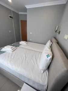 Postel nebo postele na pokoji v ubytování GRAND Deniz Hotel