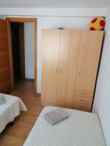 Een bed of bedden in een kamer bij Apartment first line beach El Campello (Alicante)
