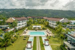 an aerial view of a resort with a swimming pool at Go away to this charming apt at Sublime w private jacuzzi included in Las Terrenas