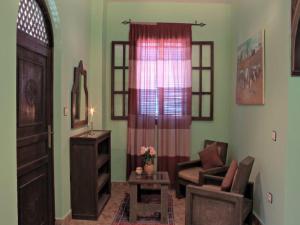 Posezení v ubytování Riad Maison Du Sud