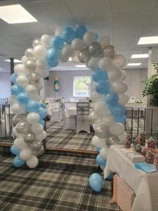 a column of blue and white balloons in a room at Harleys Inn in Chesterfield