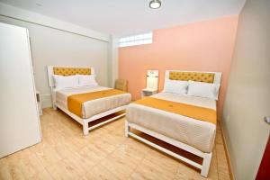 Postel nebo postele na pokoji v ubytování Mercé Hotel