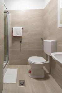 a bathroom with a toilet and a sink at Double Room Pasman 4309e in Pašman