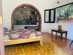 Postel nebo postele na pokoji v ubytování HABITACIONES EN VALLARTA 6 CUADRAS MALECON