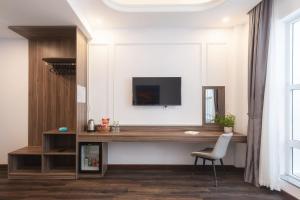 TV a/nebo společenská místnost v ubytování MSing DaLat Hotel