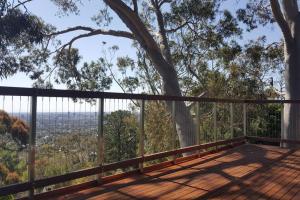 a deck with a view of a tree at Family Home Prestigious Suburb Panoramic Views in Glenunga