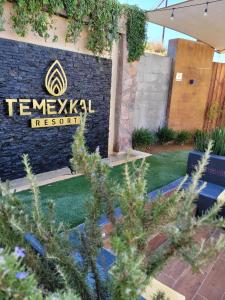 a sign for the temexka resort at TEMEXKAL RESORT in Ensenada