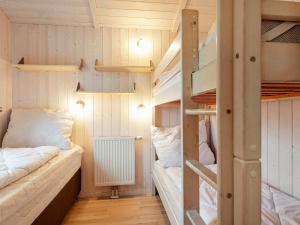 Postel nebo postele na pokoji v ubytování 5 person holiday home in GROEMITZ