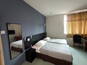 Letto o letti in una camera di Winton Hotel