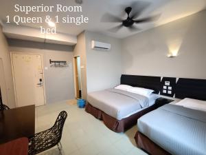 Letto o letti in una camera di Winton Hotel
