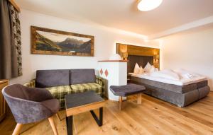 Posteľ alebo postele v izbe v ubytovaní Wellness & Sporthotel Alpenhof