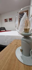 a glass bowl sitting on top of a table at Hotel El Panorama in Tapia de Casariego