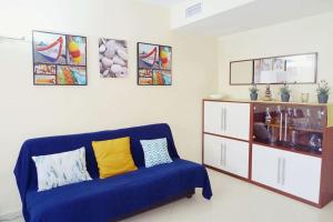 Posedenie v ubytovaní Precioso apartamento con piscina y jardín propio
