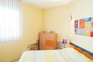Posteľ alebo postele v izbe v ubytovaní Precioso apartamento con piscina y jardín propio