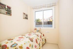Posteľ alebo postele v izbe v ubytovaní Precioso apartamento con piscina y jardín propio