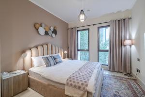 Postel nebo postele na pokoji v ubytování 1 Bedroom at Yansoon 4, Downtown Old Town with Garden View