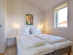 Postel nebo postele na pokoji v ubytování Two-Bedroom Holiday home in Grömitz 10