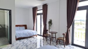 Postel nebo postele na pokoji v ubytování Uncle Park's Villa Son Trang 엉클팍