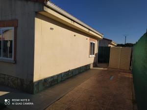 a side of a building with a door on it at Casa Vainilla in San Miguel del Pino