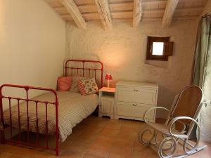 Кровать или кровати в номере Ca l'Agnès