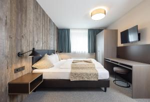 Postel nebo postele na pokoji v ubytování Haus Verwall