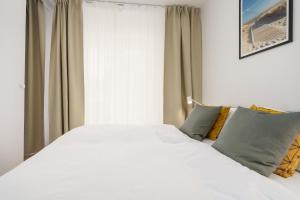 Posteľ alebo postele v izbe v ubytovaní Apartament BIRCH TREE SurfingBird Dźwirzyno