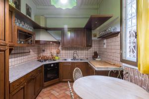A kitchen or kitchenette at De'Gombruti, Bologna by Short Holidays Még 15 kép