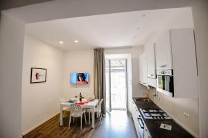 Dapur atau dapur kecil di EMA FLAT in Trastevere