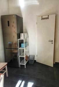 Palanda nebo palandy na pokoji v ubytování Apartment Ida