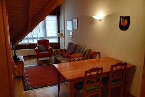 Posezení v ubytování Ático Elurra FORMIGAL + 14 fotografií