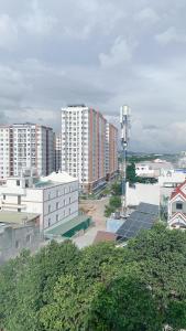 a view of a city with tall buildings at Khách Sạn FLORÉA in Phan Rang–Tháp Chàm