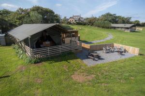 an overhead view of a tent in a field at Worms Head - Safari Tent - Llangennith in Llangennith