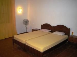 Ein Bett oder Betten in einem Zimmer der Unterkunft Som do Mar