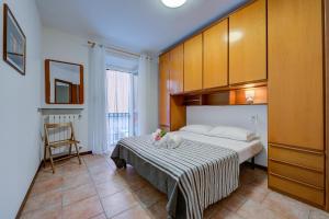 Posteľ alebo postele v izbe v ubytovaní Casa Dolce Casa Stresa 50m from lake - Happy Rentals
