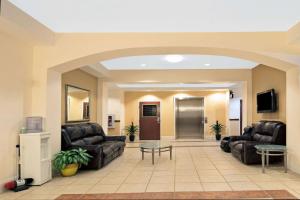 Posezení v ubytování Super 8 by Wyndham Austin/Airport South