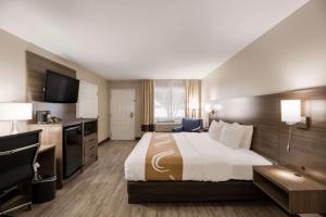 Postel nebo postele na pokoji v ubytování Quality Inn