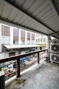 a view of a parking lot with motorcycles parked at 羅東小宅一生 in Luodong