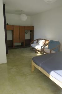 Ένα ή περισσότερα κρεβάτια σε δωμάτιο στο Spacious house with garden, La Plata center.