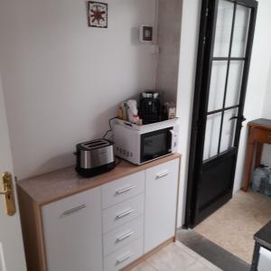 Kuchyň nebo kuchyňský kout v ubytování Villa julima