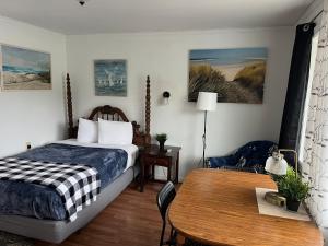 Postel nebo postele na pokoji v ubytování Cobmin Ridge Motel