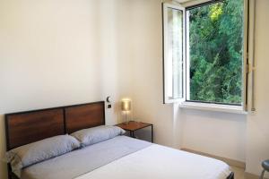 Postel nebo postele na pokoji v ubytování CiaoMi - Hostel & Long Stay - Milano Niguarda & Bicocca