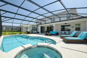 a large swimming pool with a glass roof at Sonoma Resort 7 Bedroom Vacation Home 2600YA in Kissimmee