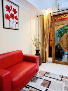 O zonă de relaxare la Ada Waktu Homestay