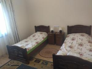 Postel nebo postele na pokoji v ubytování Garni Guesthouse