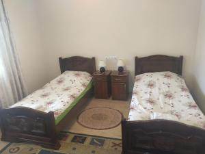 Postel nebo postele na pokoji v ubytování Garni Guesthouse