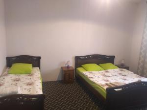 Postel nebo postele na pokoji v ubytování Garni Guesthouse