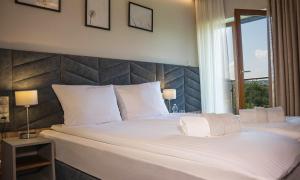Villa & Gospoda Krakowska客房内的一张或多张床位