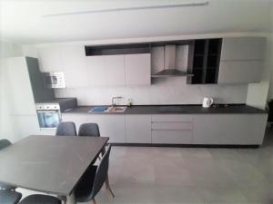 Kuchyň nebo kuchyňský kout v ubytování 161 Marinello Apartment