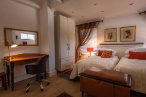Katil atau katil-katil dalam bilik di Cape Pillars Boutique Hotel